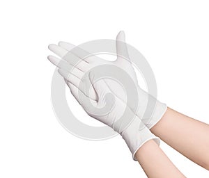 Two white surgical medical gloves isolated on white background with hands. Rubber glove manufacturing, human hand is wearing