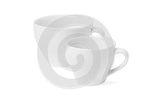 Two white tea cups for drink isolated on white background. Ceramic coffee cup or mug close up. Mock-up classic porcelain