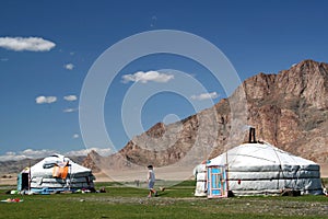 Two white tents called gher