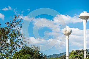 Two white Water Tower in mountain.