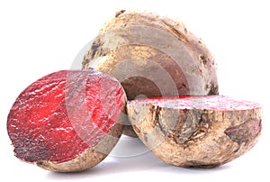 Two whole beetroots on white background