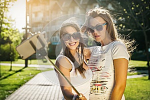 Two wild young women taking a selfie