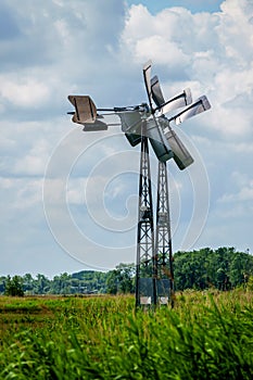 Two windmills in the Biesbosch National Park to maintain water levels.