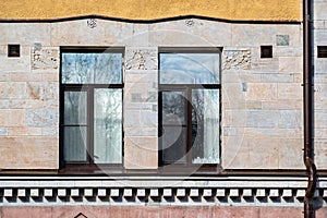 Two windows and a drain