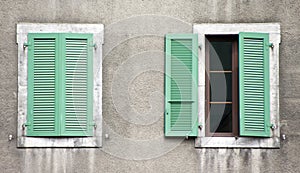 Two windows, green shutters