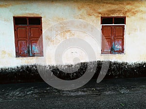 Two Windows on the old wall