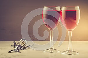 Two Wine glass and corkscrew on a dark background/ Two red Wine glass and corkscrew on a dark background. copyspace