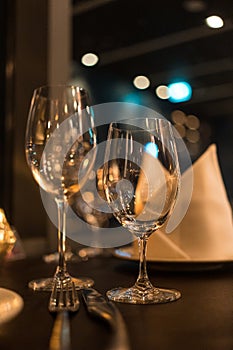 Two wine glasses in the luxury restaurant, beautiful evening restaurant