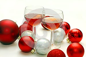 Two Wine Glasses Surrounded by Christmas Decorations