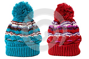 Two winter knit ski hat isolated white red blue cut out