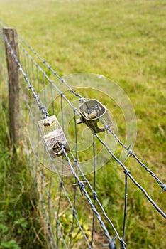 Two wire tensioners in an agricultural fence