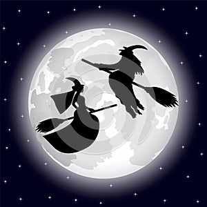 Two witches on a background of the full moon on Halloween night