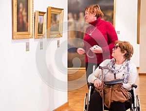 Two woman in art gallery