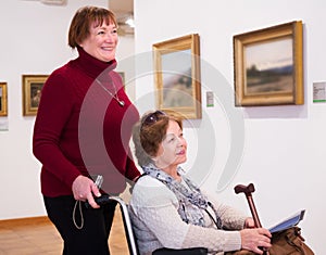 Two woman in art gallery