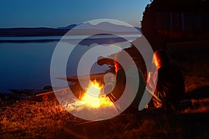 Two woman on beach lake