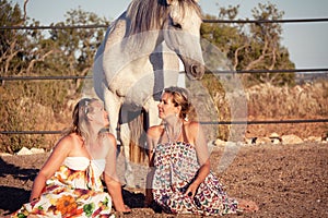 Two woman horse and dog outdoor in summer happy