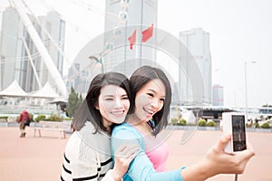 Two woman selfie in hongkong