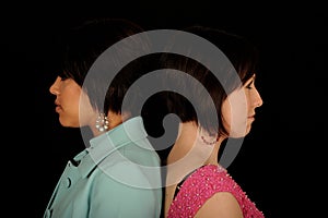 Two women back to back