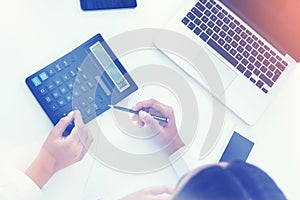 Two women calculating