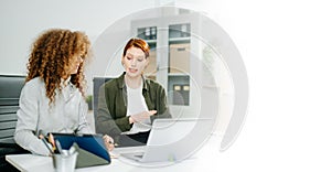 Two women coding together in a high-tech office, showcasing teamwork, software development, and female empowerment