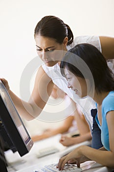 Two women in computer room