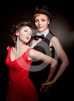 Two women dancing tango. One woman pretend be man