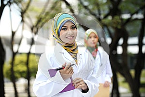 Two Women Doctor With Scarf, Outdoor