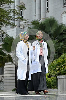 Two Women Doctor With Scarf, Outdoor