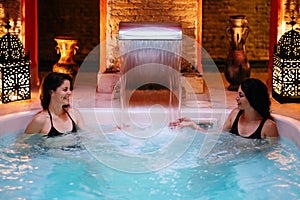 Two women enjoying Arabic baths Hammam in Granada