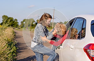 Two women fighting at the roadside