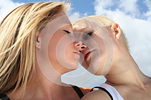 Two women flirting photo