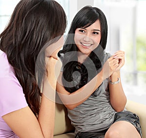 Two women friends chatting