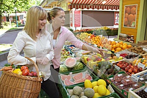 Two women on the fruit market