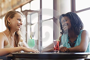 Two women having fun in pub