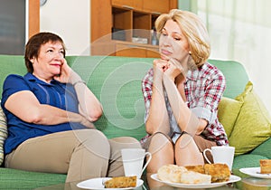 Two women having serious conversation
