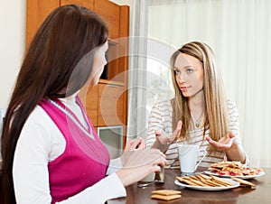 Two women having squabble photo