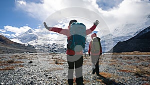 Two women hikers hiking in winter