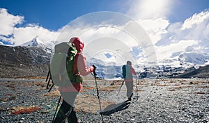 Two women hikers hiking in winter