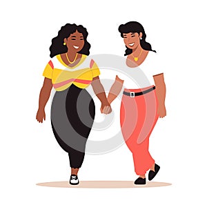 Two women holding hands, walking, smiling, enjoying companionship, diverse ethnicities, casual photo