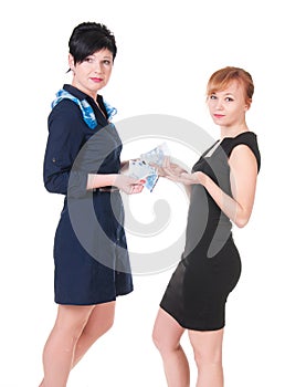 Two women holding money