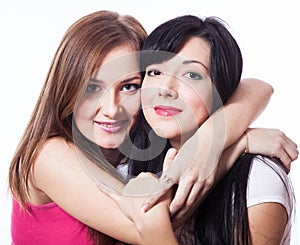 Two women hugging.