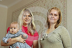 Two women and infant.