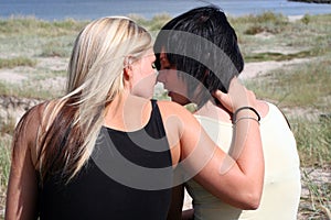 Two women kissing