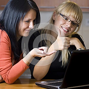 Two women on laptop