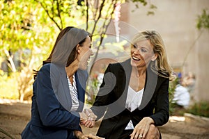 Two women making a deal