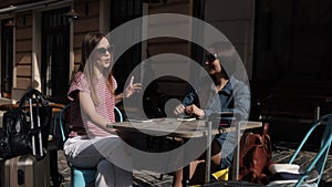 Two women, Mobile Travelers, Table Engagement