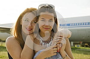 Two women mother and daughter met at the airport after trip