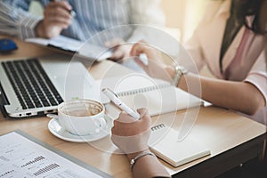 Two women participate business meeting photo