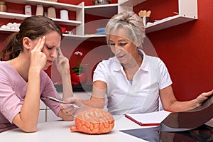 Two women talking abaut brain diseases