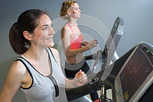Two women training in gym